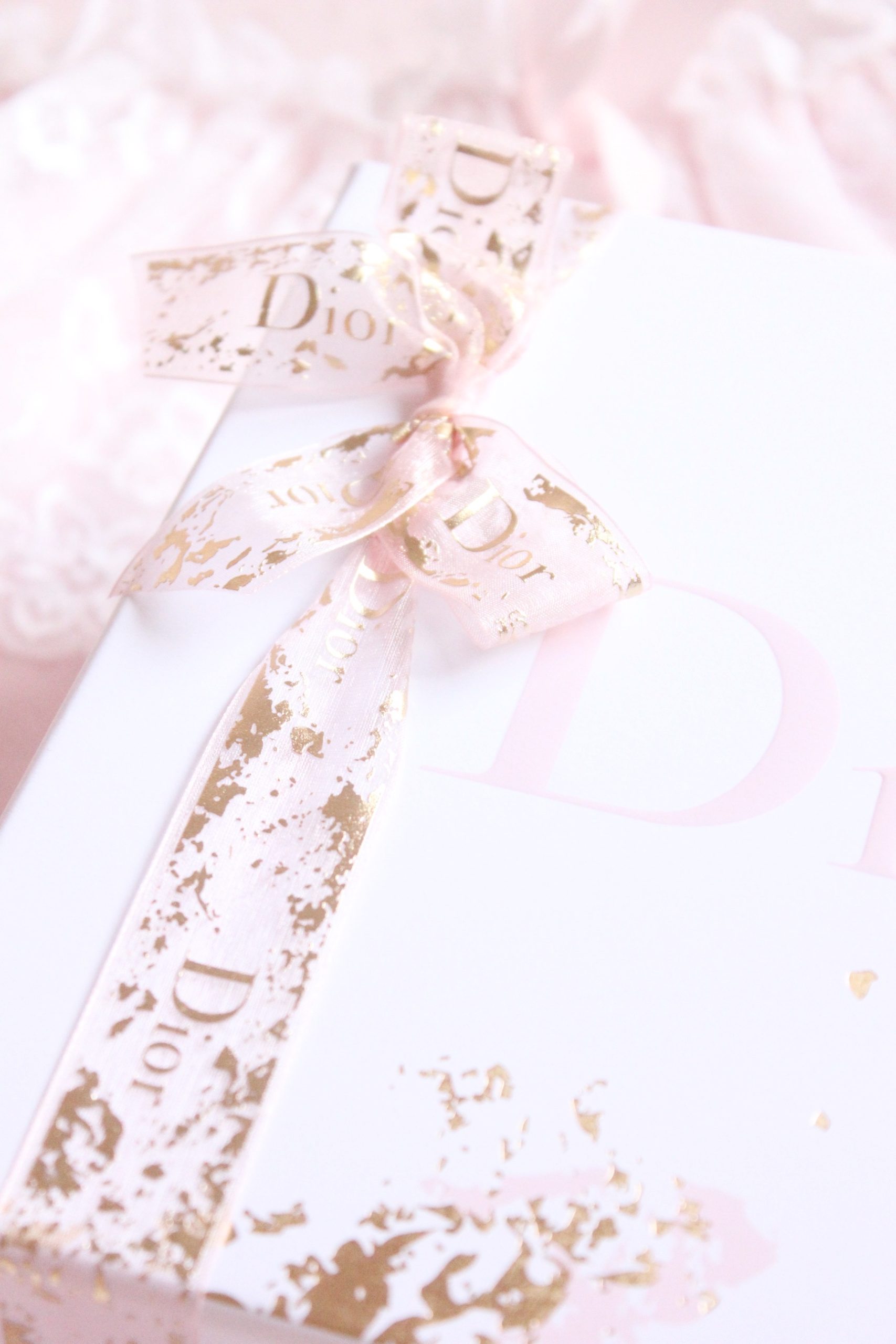 Love the ribbon rose on Dior gift wrap #giftwrapped #giftwrapping #dior