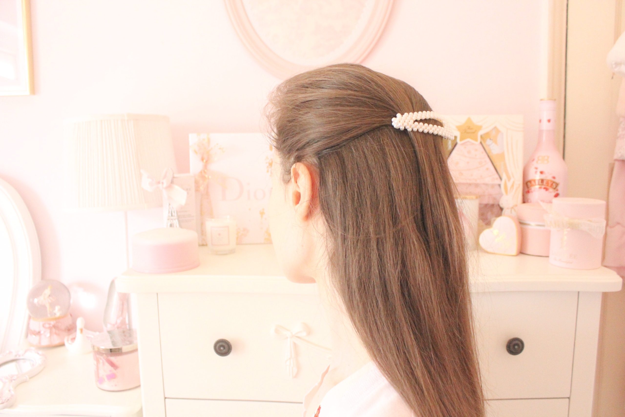 Pink ribbon in hair - Julia Berolzheimer